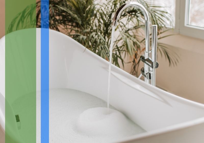 new bathtub with faucet on