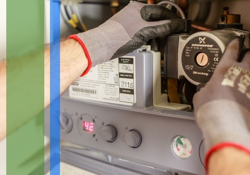 plumber repairing water heater