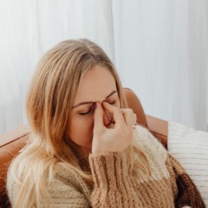 a woman with a headache