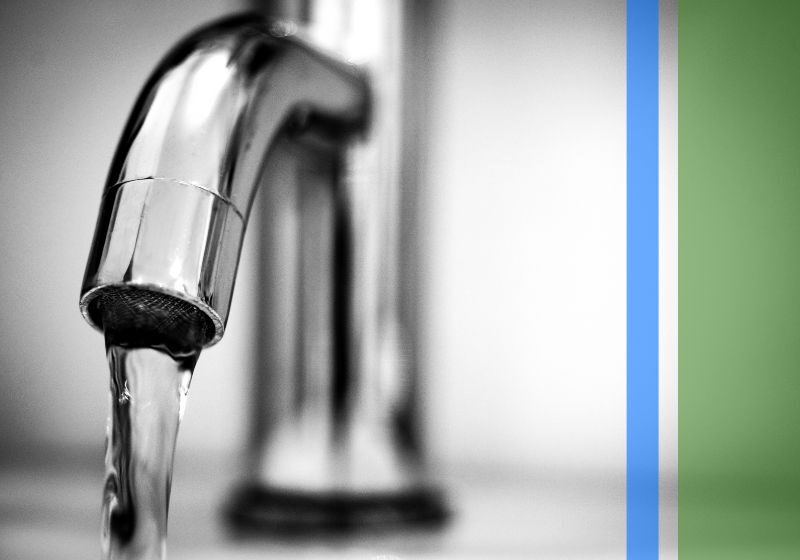 Water flowing from a sink faucet