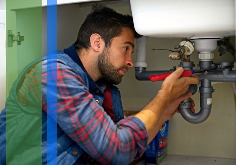 Plumbing fixing a sink.